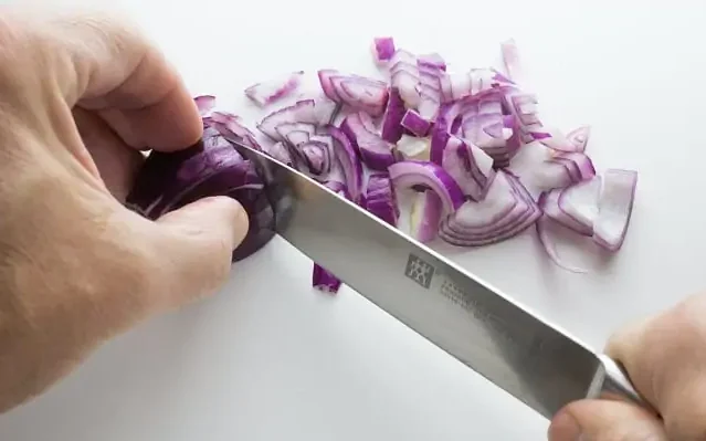 which knife should be used to cut an onion